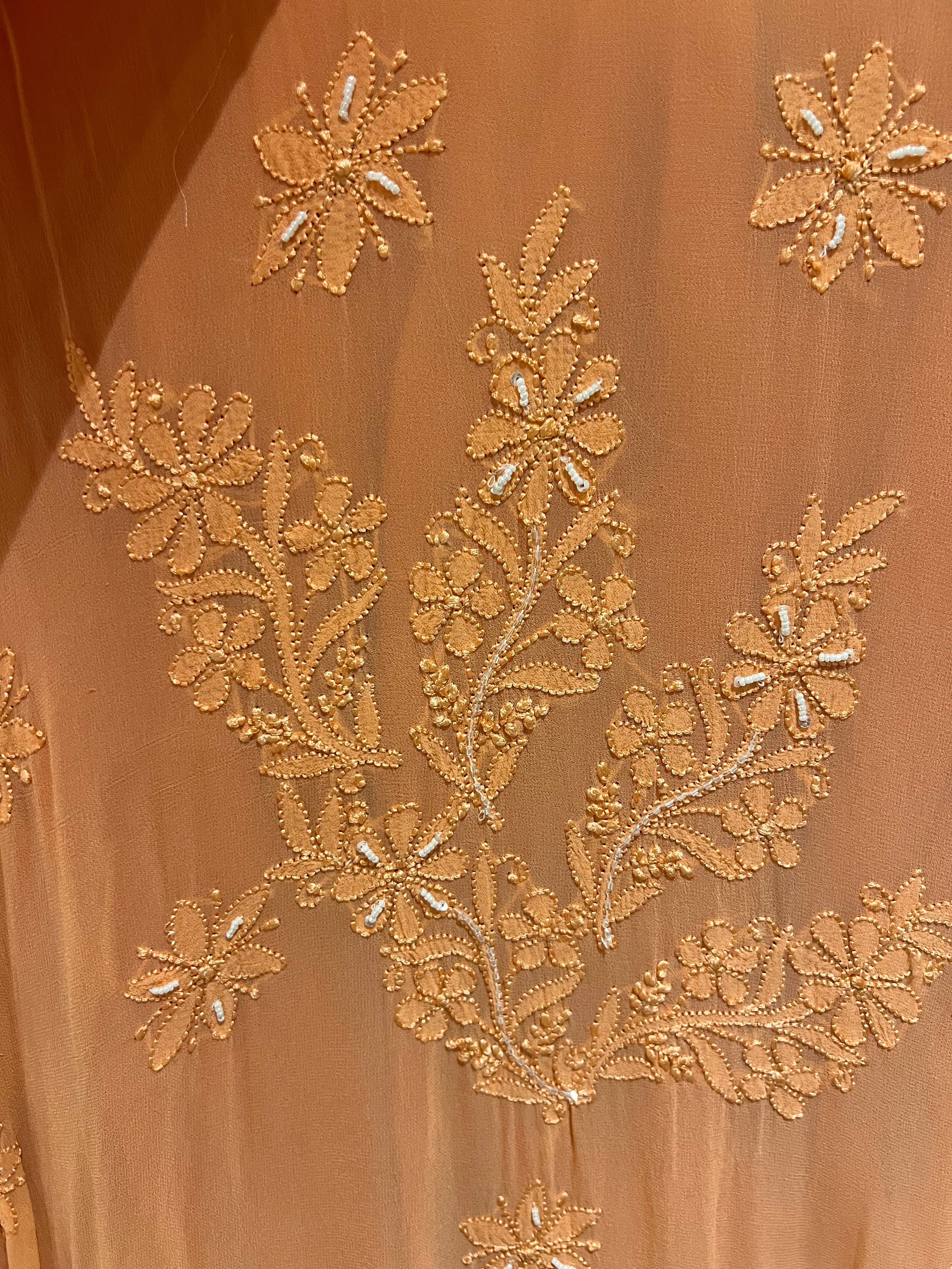 Orange chikankari set with pearls and embelishment